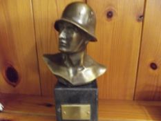 Bronze bust in the form a German soldier carried o