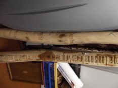 Two large carved logs with American states