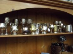 Large collection of plated tankards and goblets