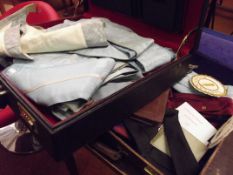 Two cases containing Masonic Regalia