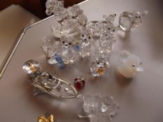 Collection of Swarovski figures and other similar