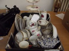 Asssorted items to include two part tea sets, cake
