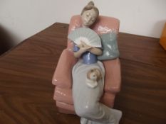 Nao figure, girl in armchair