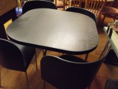Contemporary breakfast table and four segment chai