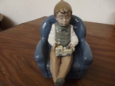 Nao figure, boy in armchair