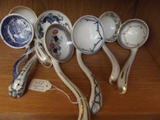 Collection of seven ceramic ladles