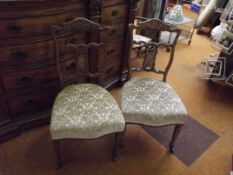 Pair of Victorian chairs on casters