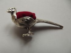 Silver pin cushion in the form of a pheasant