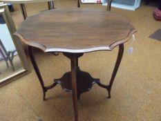 Edwardian mahogany centre table with shaped edge a