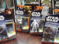 Collection of 4 Star Wars figures, The Saga collec