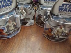 Collection of 4 Star Wars figures, Droid factory