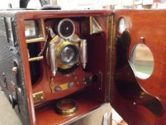 An early boxed camera in fitted case