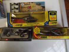 Two Corgi helicopters together with a Corgi racing