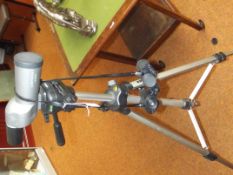 Monocular with tripod and a pair of binuculars