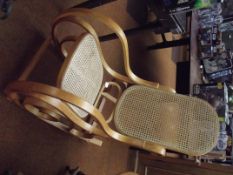 Bentwood rocking chair with cane back and seat