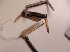 3 pen knives, one being a girl guide knife