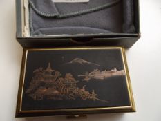 Musical compact with image of mount fuji