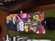 3 Star Wars figures and Darth Vader figure