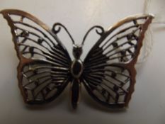 Silver pin brooch in the form of a butterfly