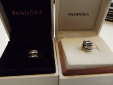 2 Pandora charms, boxed
