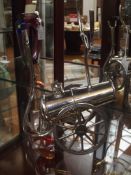 Wine holder in the form of a canon