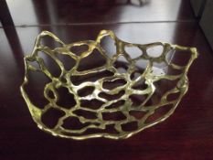 Signed brass modern fruit bowl