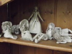 7 unusual pottery figures