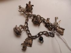 Silver charm bracelet and charms