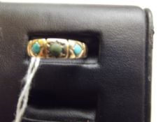 18 ct gold 3 stone turquoise ring, centre stone du