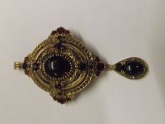 Victorian 9 carat yellow gold pendant/brooch set with numerous garnets