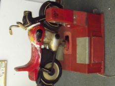 Child's ride-on coin operated motorcycle, in worki