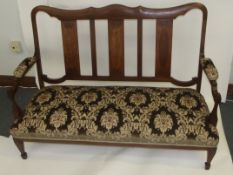 Late Victorian/Edwardian salon room settee, strung inlay to the shaped top rail and splats,