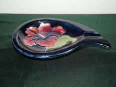 Moorcroft ashtray in the Hibiscus pattern, length 15cm