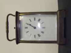 Early 20th century brass carriage clock, striking on a gong French movement stamped 'Brevettee S.G.