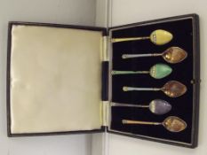 Cased set of six silver and enamel guilloche spoon