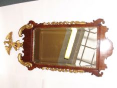 19th century (possibly earlier) bevel edged wall mirror with gilt eagle finial and gilt leaf