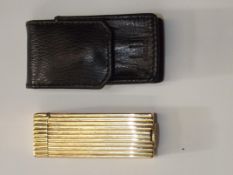 Dunhill 14ct gold cigarette lighter with case