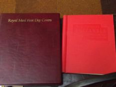 Folder of first day covers and stamp album