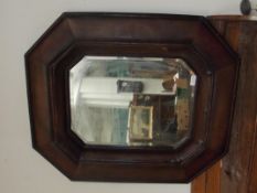 Octagonal faux leather framed mirror