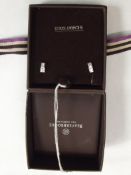 Pair of 9 carat gold earrings set with white stone