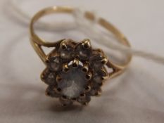 9 carat gold dress ring set with cluster gemstones