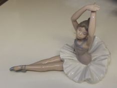 Nao figure of a seated ballerina