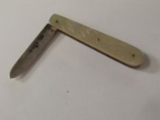 Silver fruit knife with bright cut decoration and