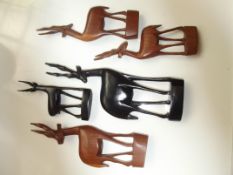 5 carved African antelopes