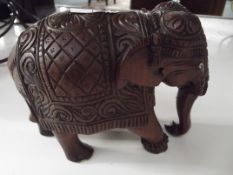 Well carved elephant , tusk missing
