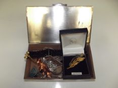 Plated jewellery box containing various vintage co