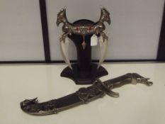 Two decorative display weapons, one with stand