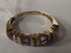 9 carat gold dress ring set with amethyst and chip