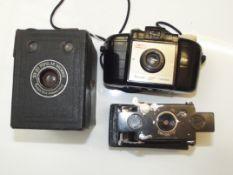 3 vintage cameras