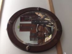 Arts and crafts circular wall mirror with hammered